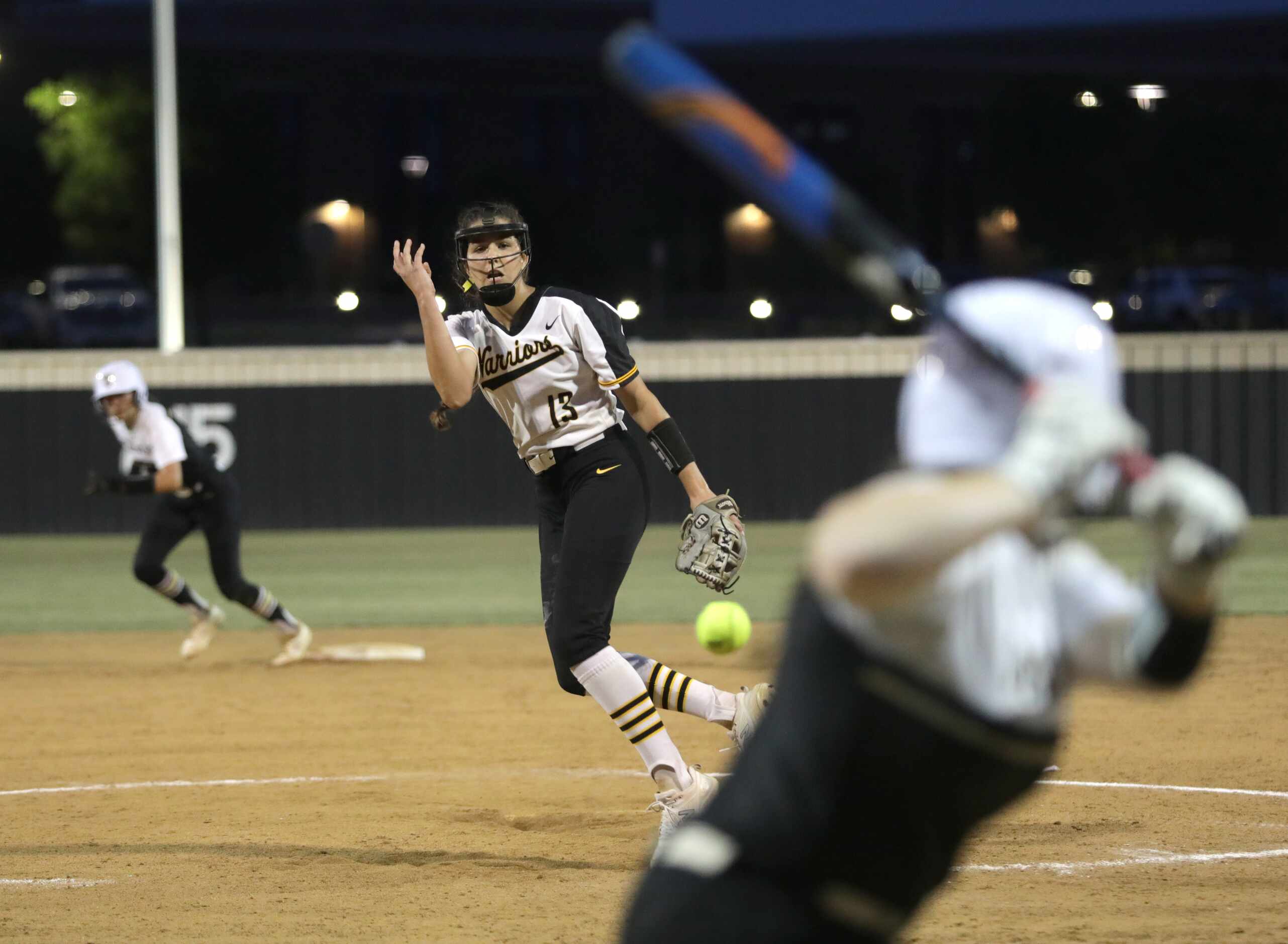 Frisco Memorial High School #13, Madelyn Muller, pitches to The Colony High School #18,...