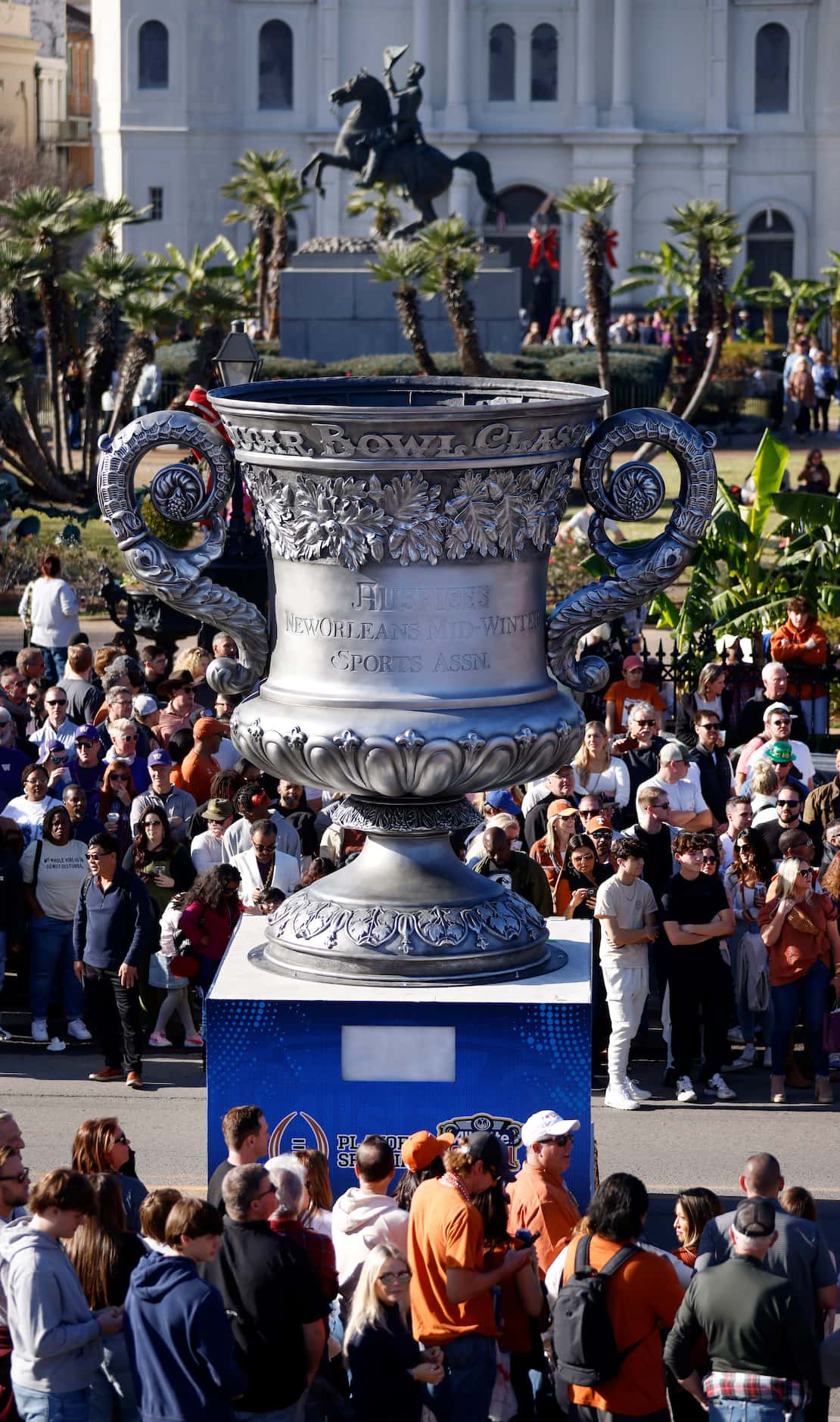 A Sugar Bowl Classic Trophy makes it’s way down Decatur St during the Mardi Gras-style New...