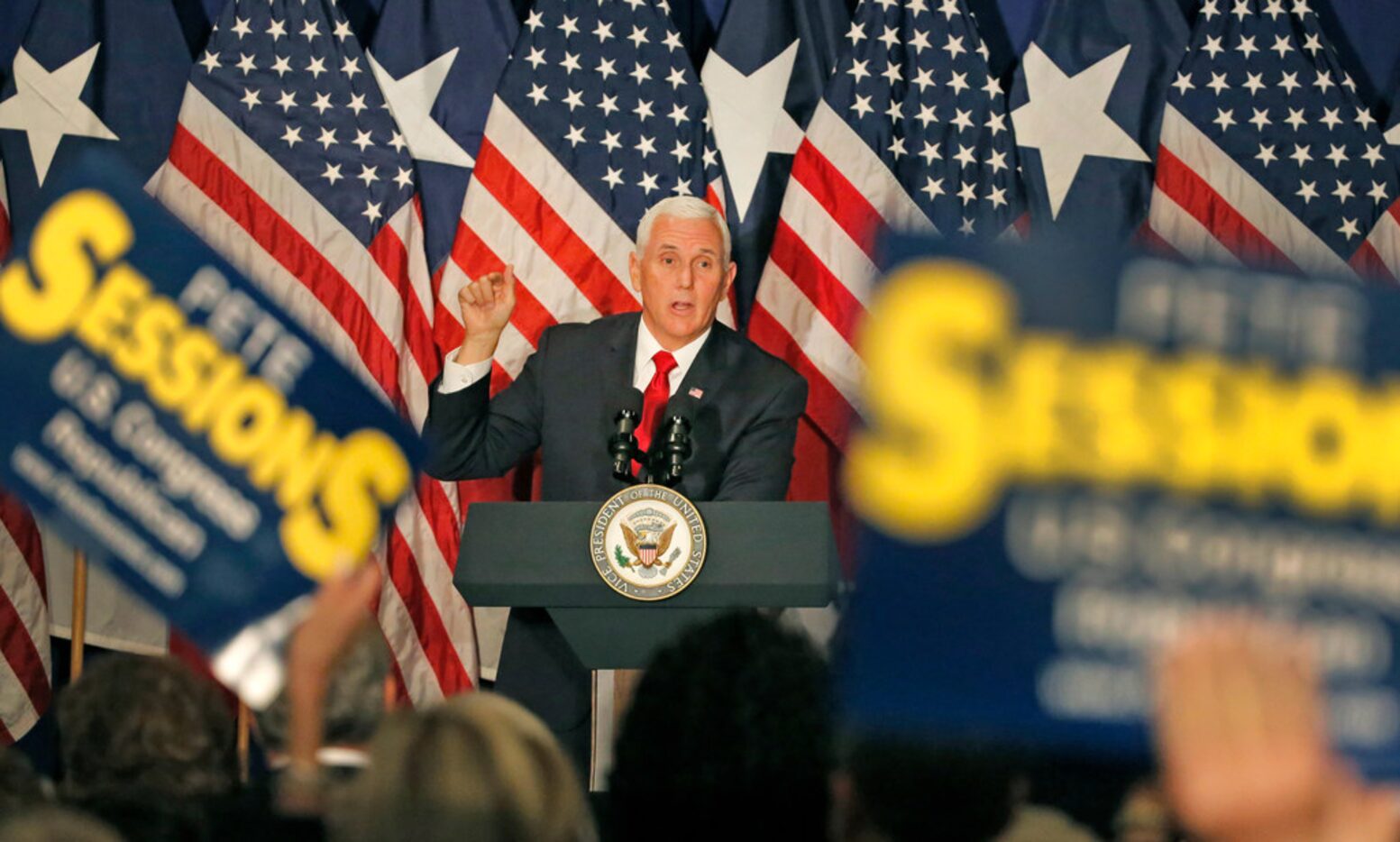 US Vice President Mike Pence speaks to the crowd as he campaigns for congressman Pete...