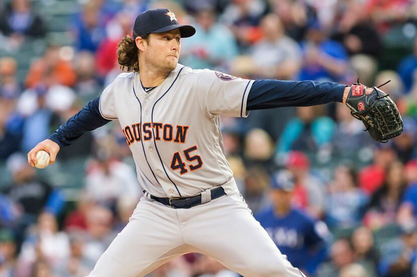 Houston Astros starting pitcher Gerrit Cole throws during the first inning against the Texas...