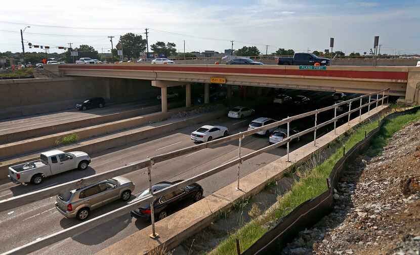 Traffic moves on U.S. Highway 75, Central Expressway, under the Plano Parkway bridge....