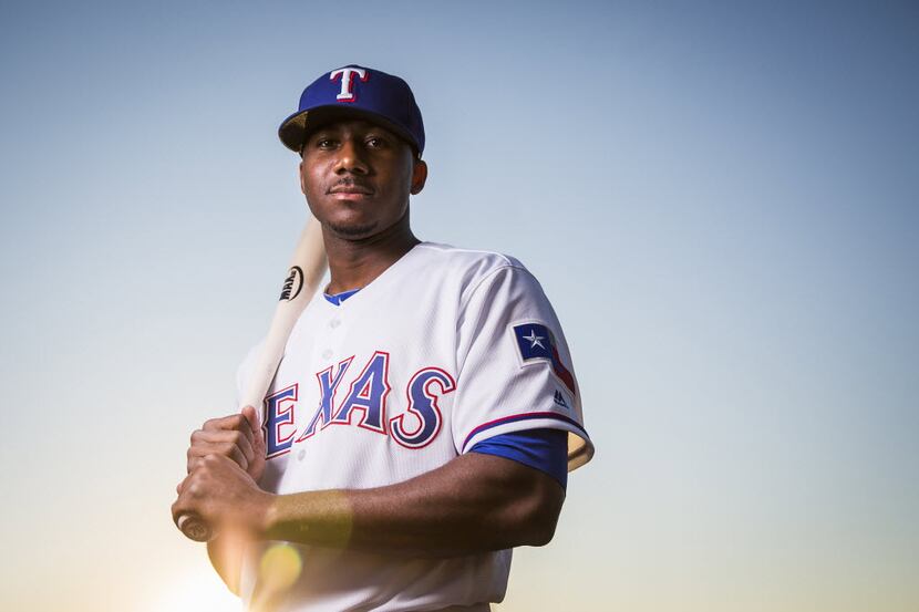 Texas Rangers oufielder Lewis Brinson photographed during spring training photo day at the...
