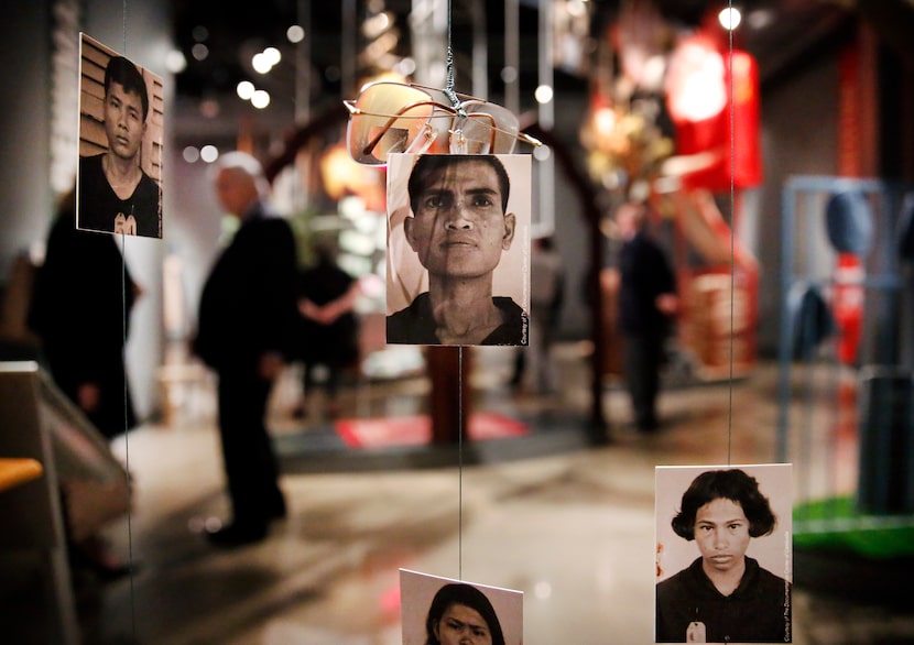 Photos of Cambodian genocide victims (carried out by the Khmer Rouge) and their eyewear are...