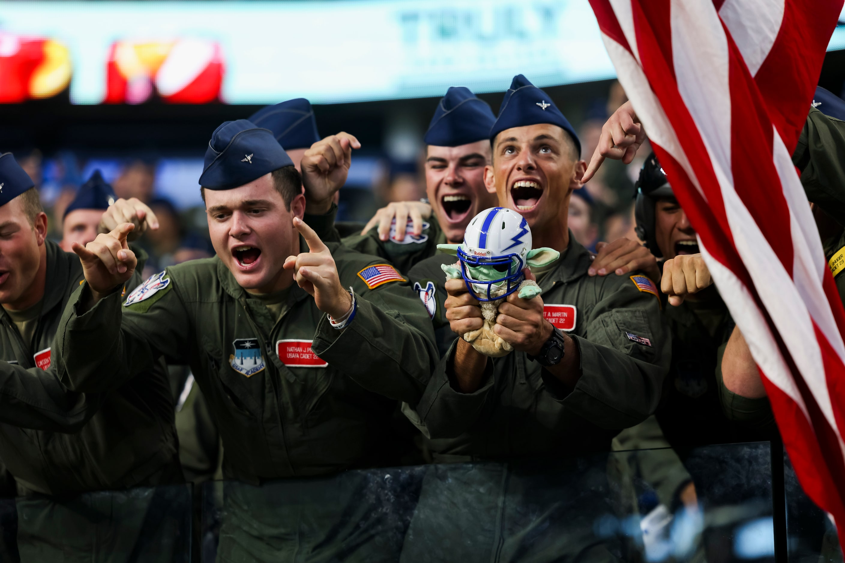 Air Force Cadets celebrate a missed field goal by the Army Black Knights during first...