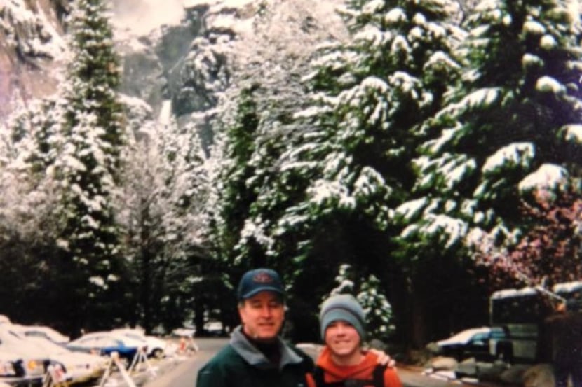 Ralph Young (left) with his son Michael before Ralph's death in 2009. Michael Young runs to...