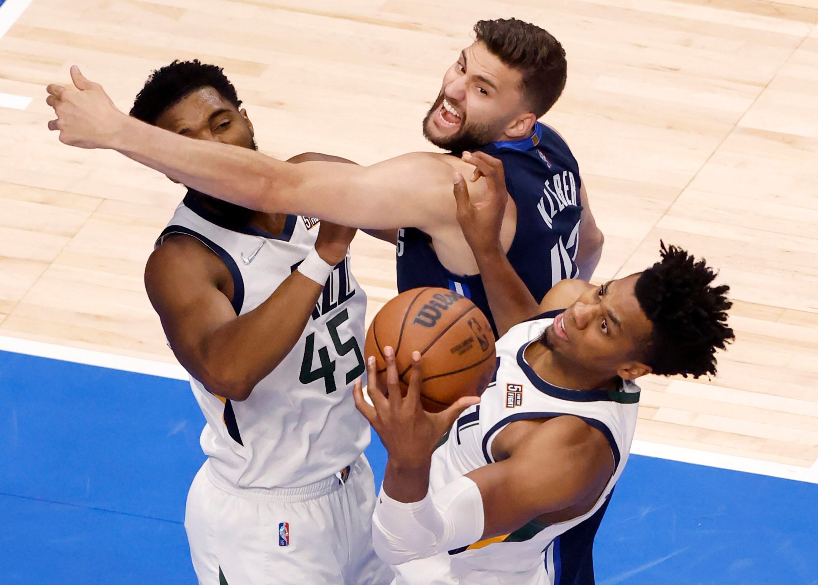 Utah Jazz center Hassan Whiteside (21) rebounds the ball in front of Dallas Mavericks...