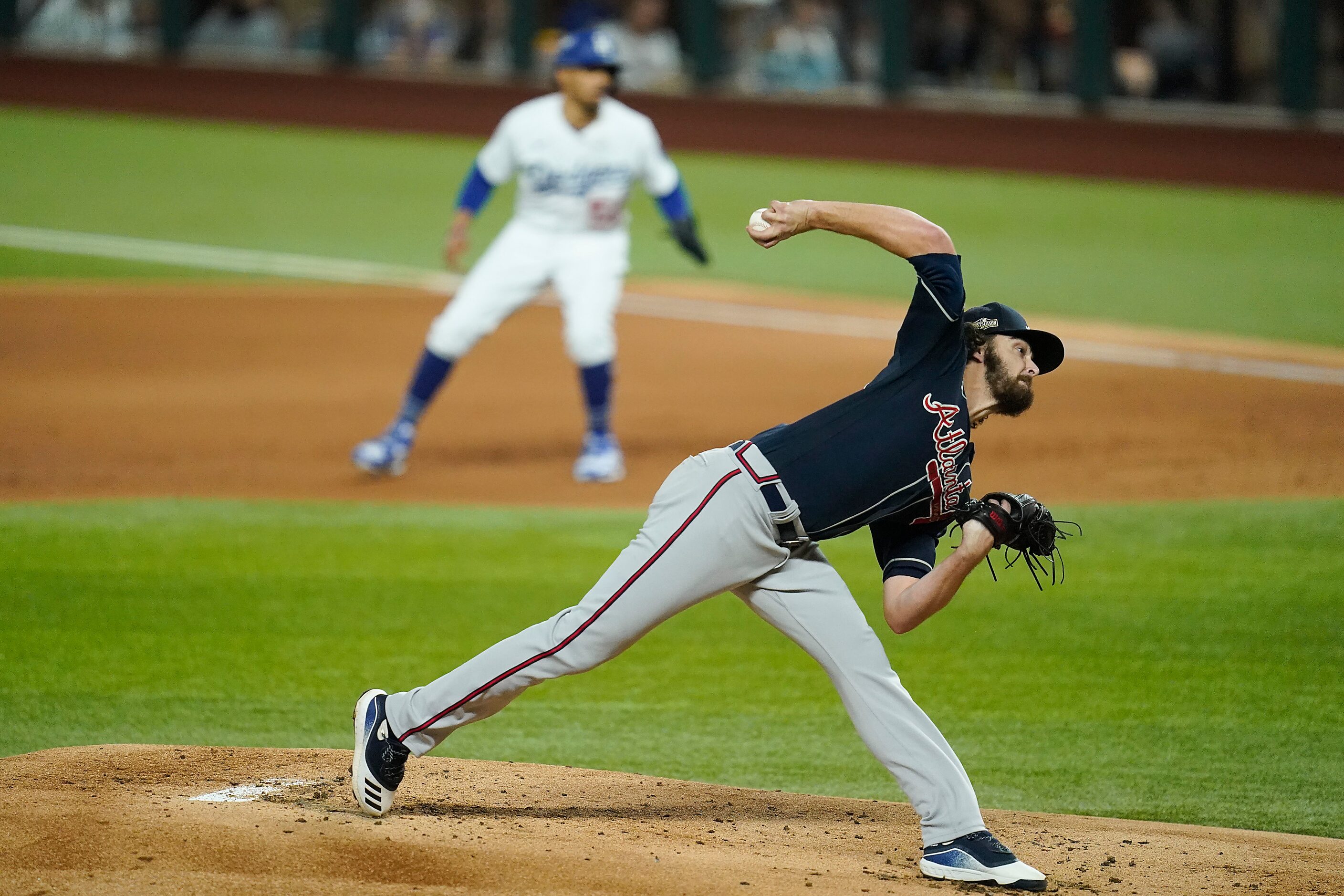 Atlanta Braves starting pitcher Ian Anderson delivers during the first inning against the...