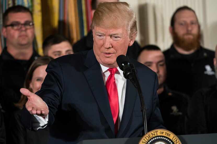 (FILES) In this file photo taken on April 26, 2018 US President Donald Trump speaks at a...