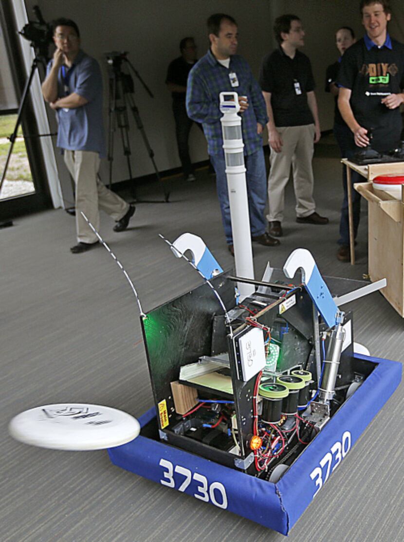 Test engineer Rachel Moore worked with other TI employees and a dozen high school students...