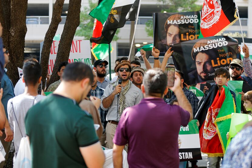 Basir Noory speaks to protesters during a demonstration outside of Sen. John Cornyn's office...