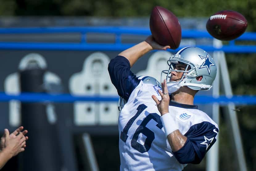 Dallas Cowboys quarterback Matt Cassel throws a pass during practice at the Cowboys Valley...