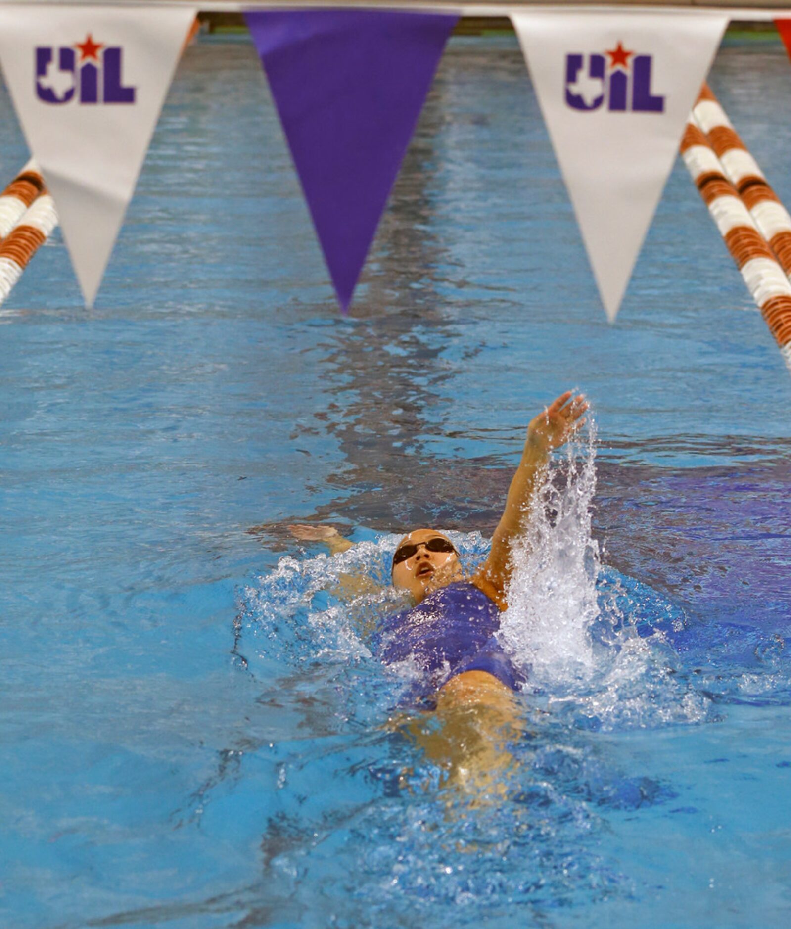 Class 5A preliminaries of the UIL state swimming and diving meet were held in Austin, Texas...