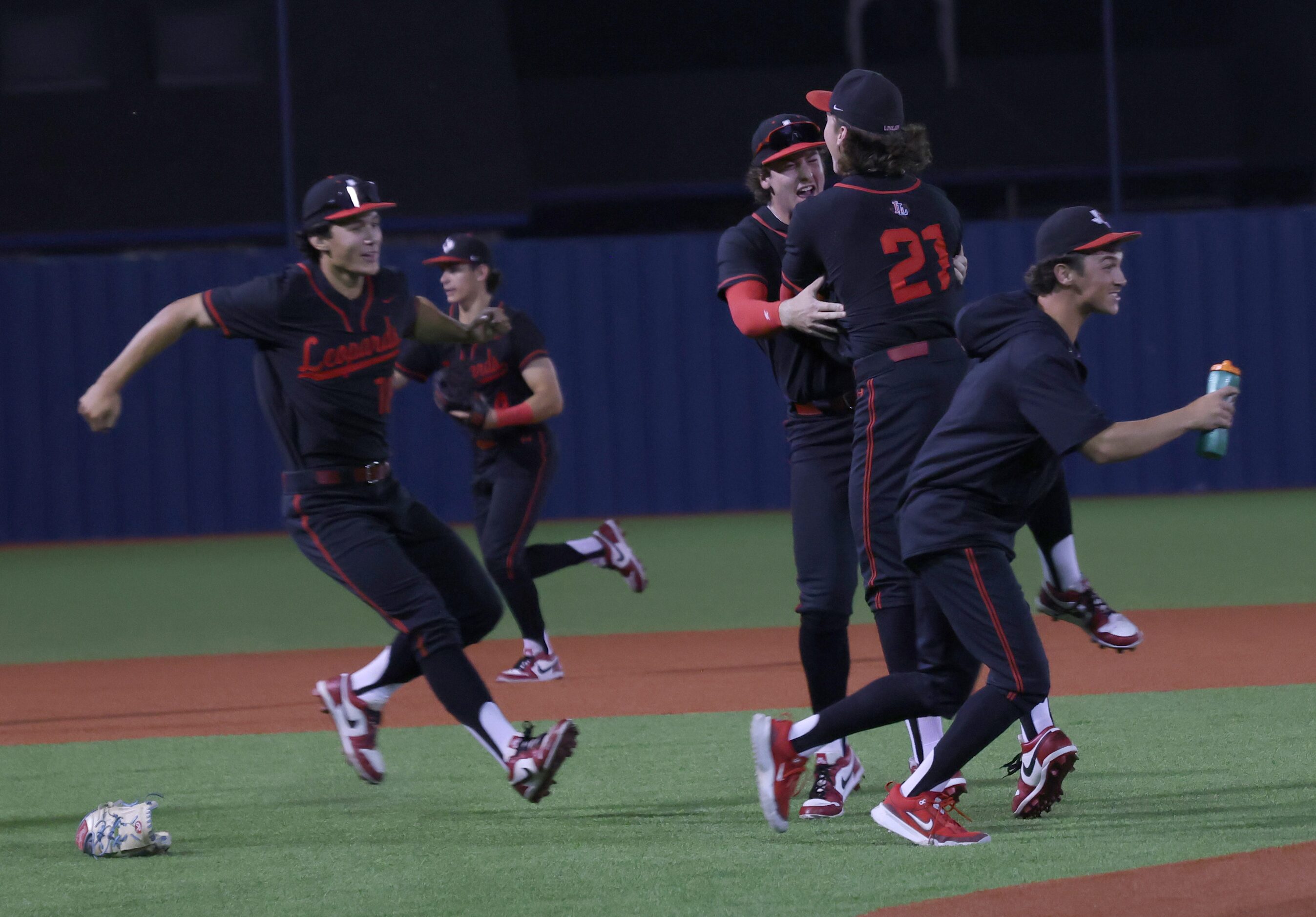 Lovejoy players celebrate on the field after their 7-1 victory over Frisco to advance. The...