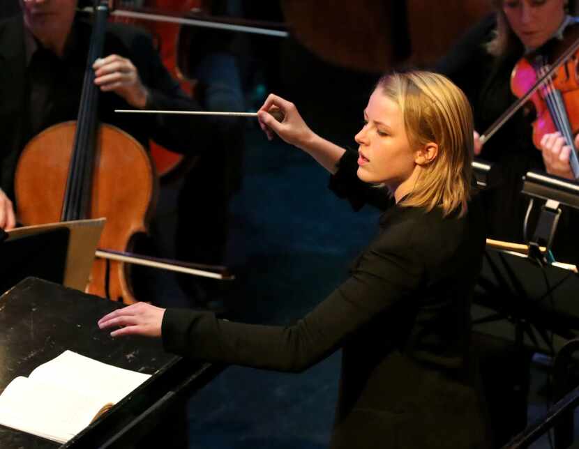 Ruth Reinhardt conducts the Dallas Symphony Orchestra during a concert that fit...