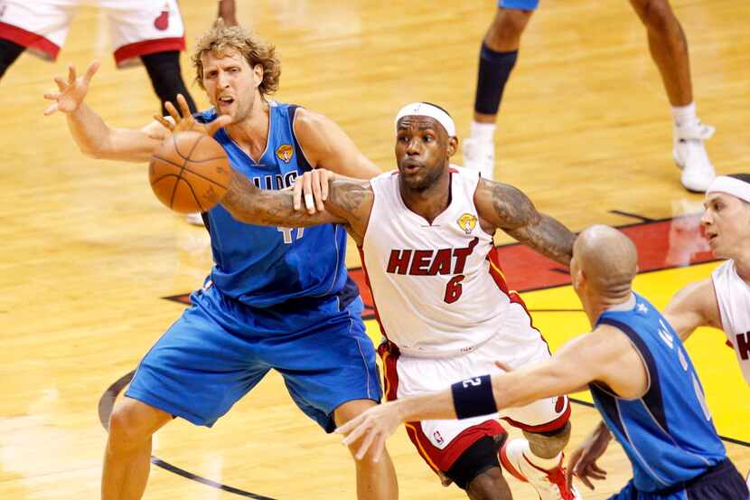 Miami Heat small forward LeBron James (6) intercepts a pass intended for Dallas Mavericks...