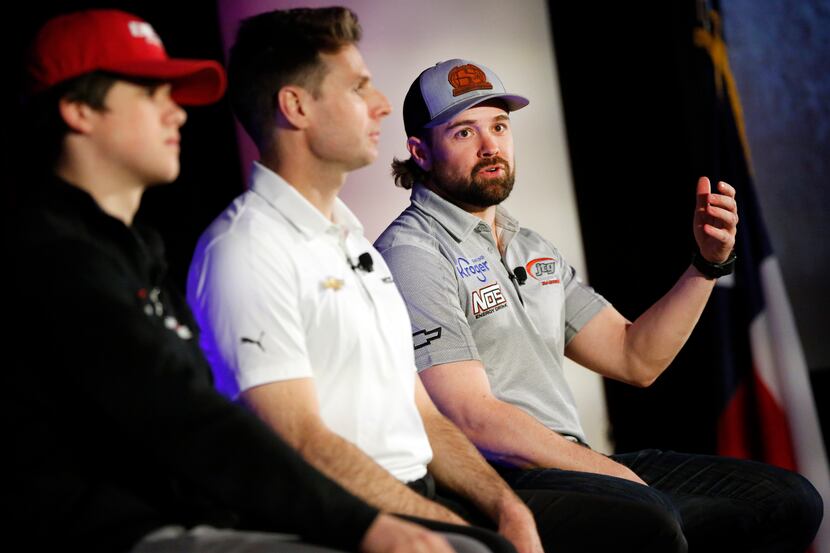 NASCAR Cup driver Ricky Stenhouse, Jr. (right)  answers questions about the upcoming race...