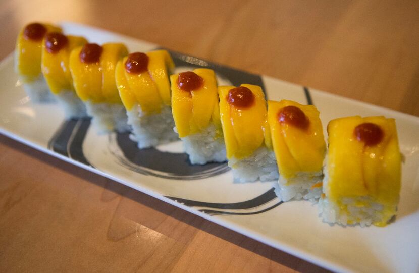 Tropical rolls line a plate at Sushi Zushi 