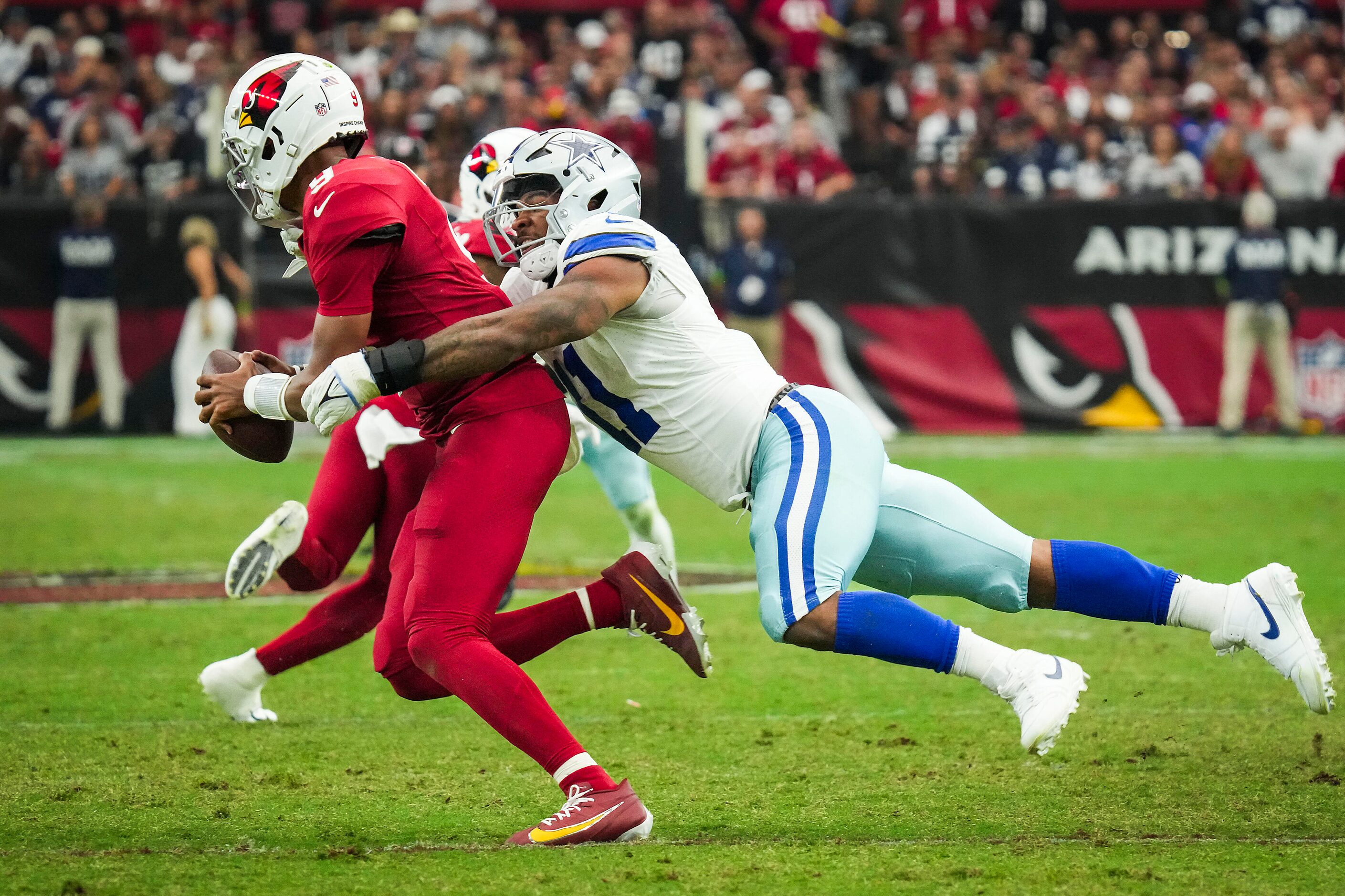 Dallas Cowboys linebacker Micah Parsons (11) sacks Arizona Cardinals quarterback Joshua...