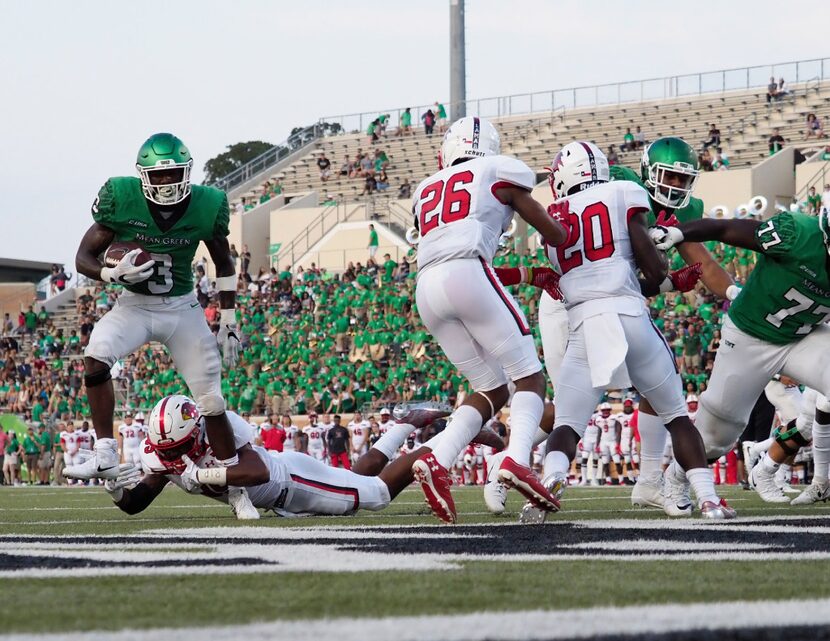 North Texas running back Jeffery Wilson (3) rushes the ball to score a touchdown against the...