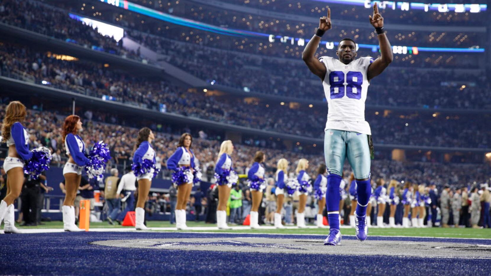 Watch: Dez Bryant gets massive double high-five from young fan