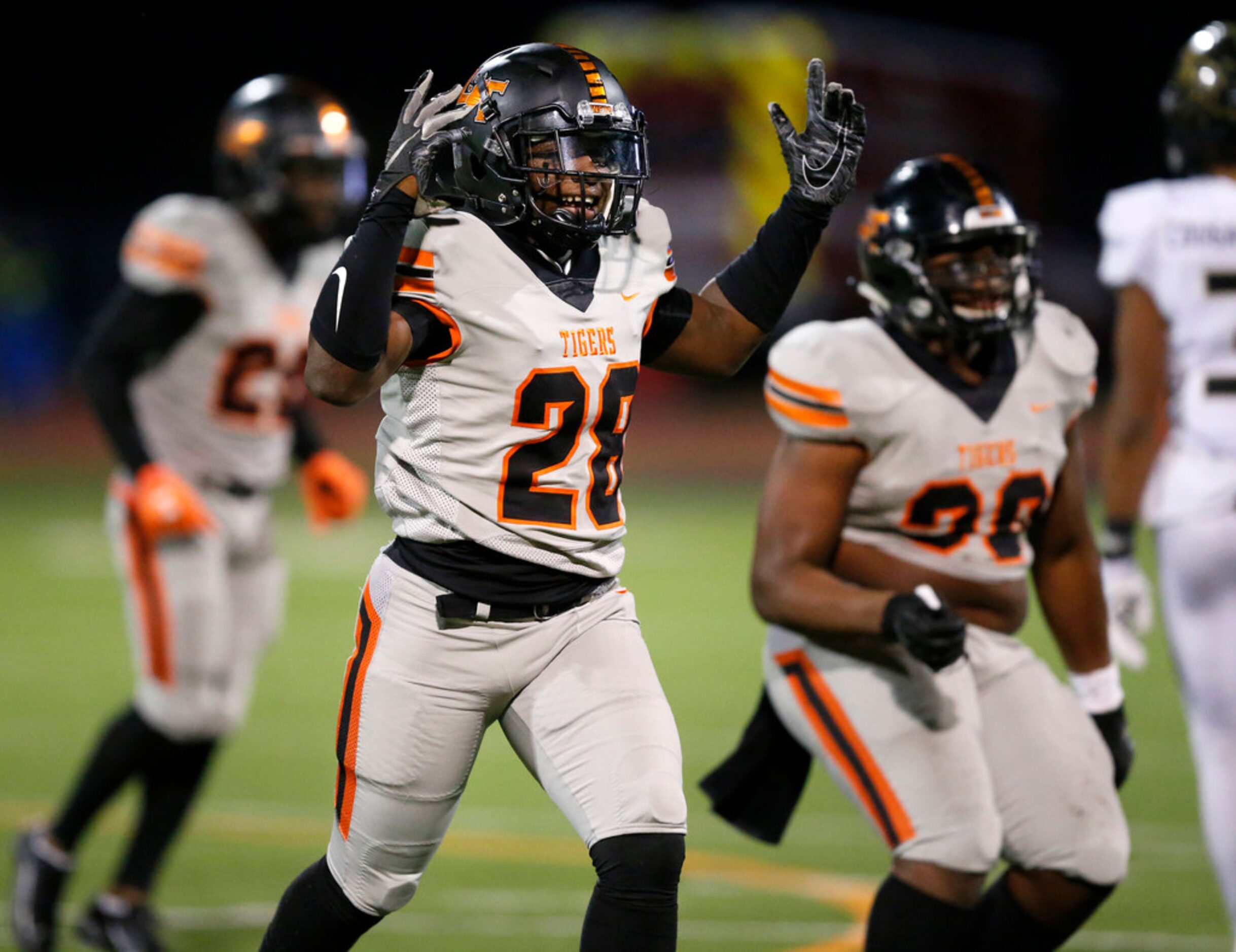 Lancaster linebacker Kourtney Washington (28) celebrates a third quarter turnover by The...