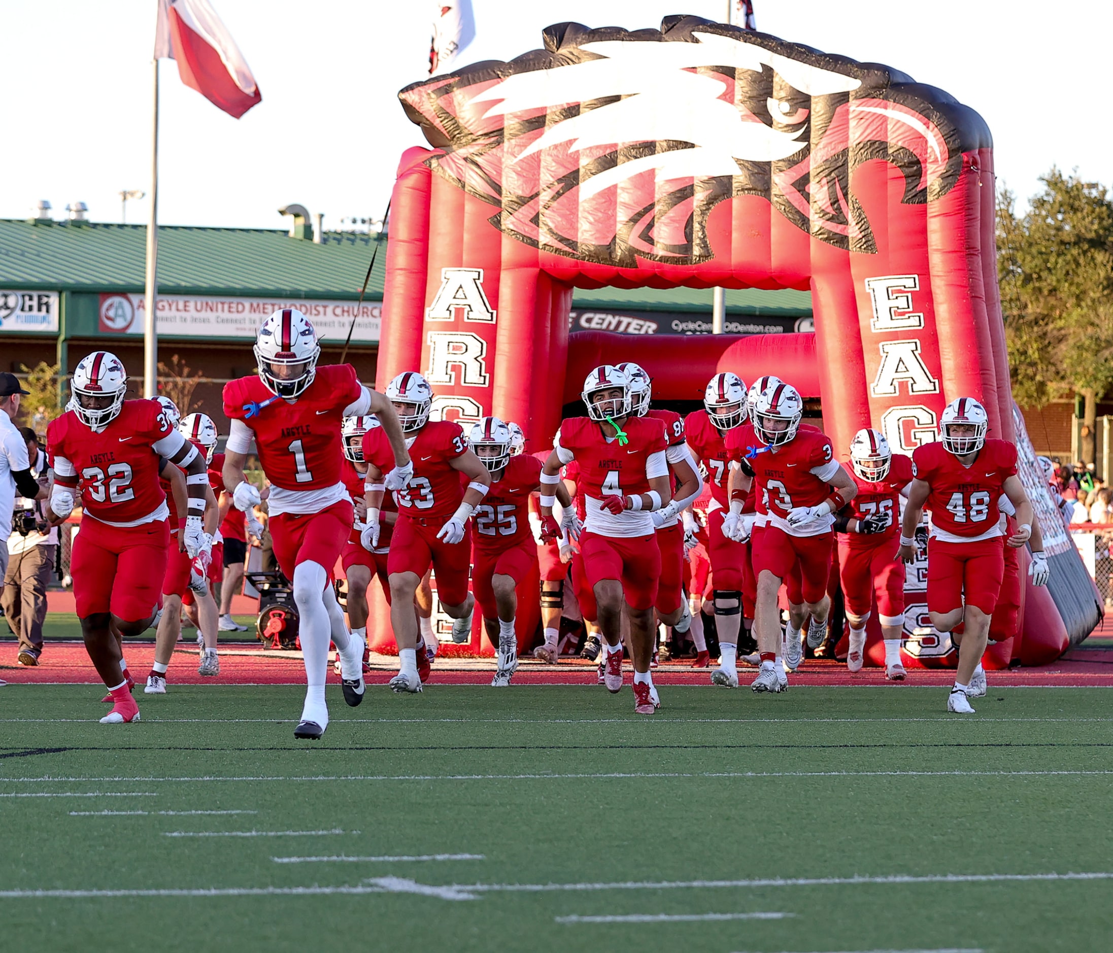 The Argyle Eagles enter the field to face Colleyville Heritage in a District 3-5A Division...