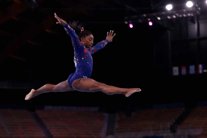 USA’s Simone Biles competes on the balance beam in a women’s gymnastics event during the...