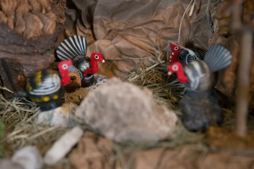 Wooden turkeys are part of a Nativity scene built by Carmen Meza in her home.