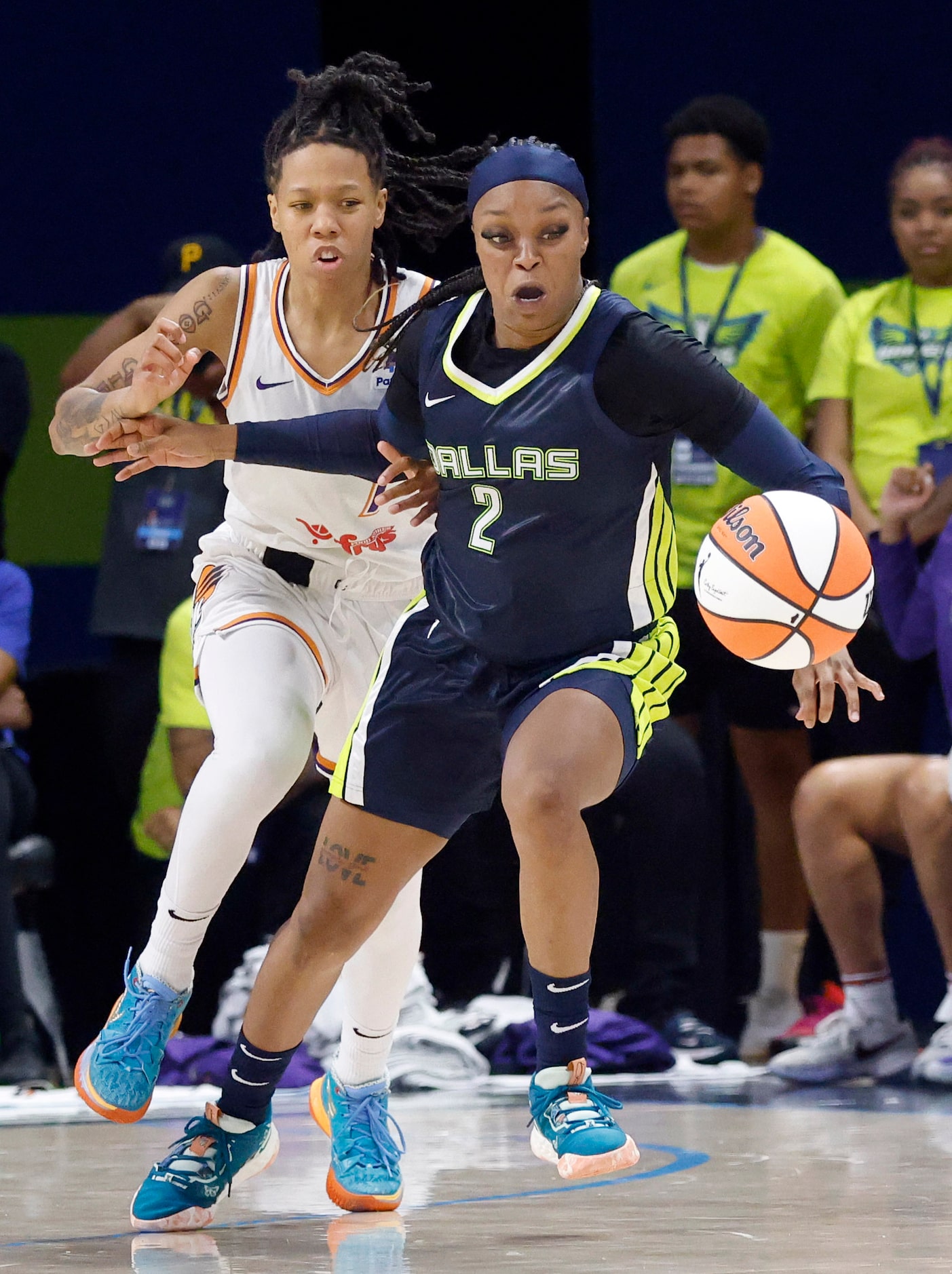 Dallas Wings guard Odyssey Sims (2) has the ball knocked away by Phoenix Mercury guard Sug...