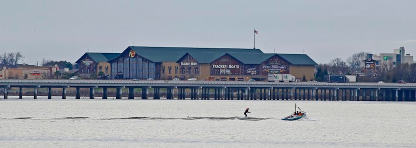 
A waterskier enjoys Lake Ray Hubbard, as seen from Elgin B. Robertson Park, in front of...