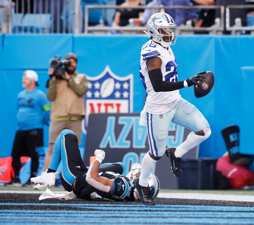 Dallas Cowboys cornerback DaRon Bland (26) outruns Carolina Panthers tight end Tommy Tremble...