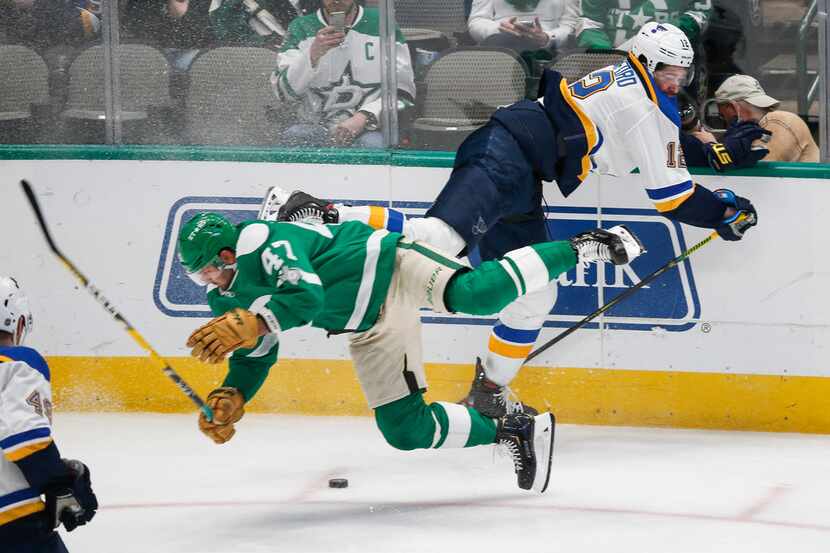 Dallas Stars right wing Alexander Radulov (47) is upended by St. Louis Blues left wing Zach...