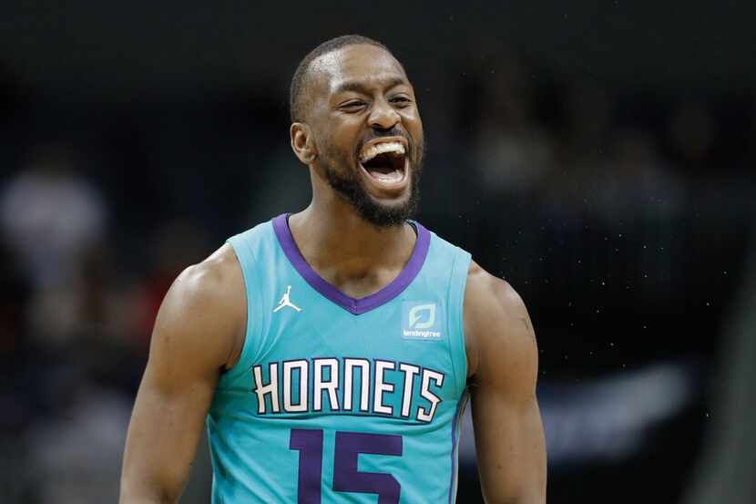 Charlotte Hornets guard Kemba Walker (15) reacts after making a basket against the...