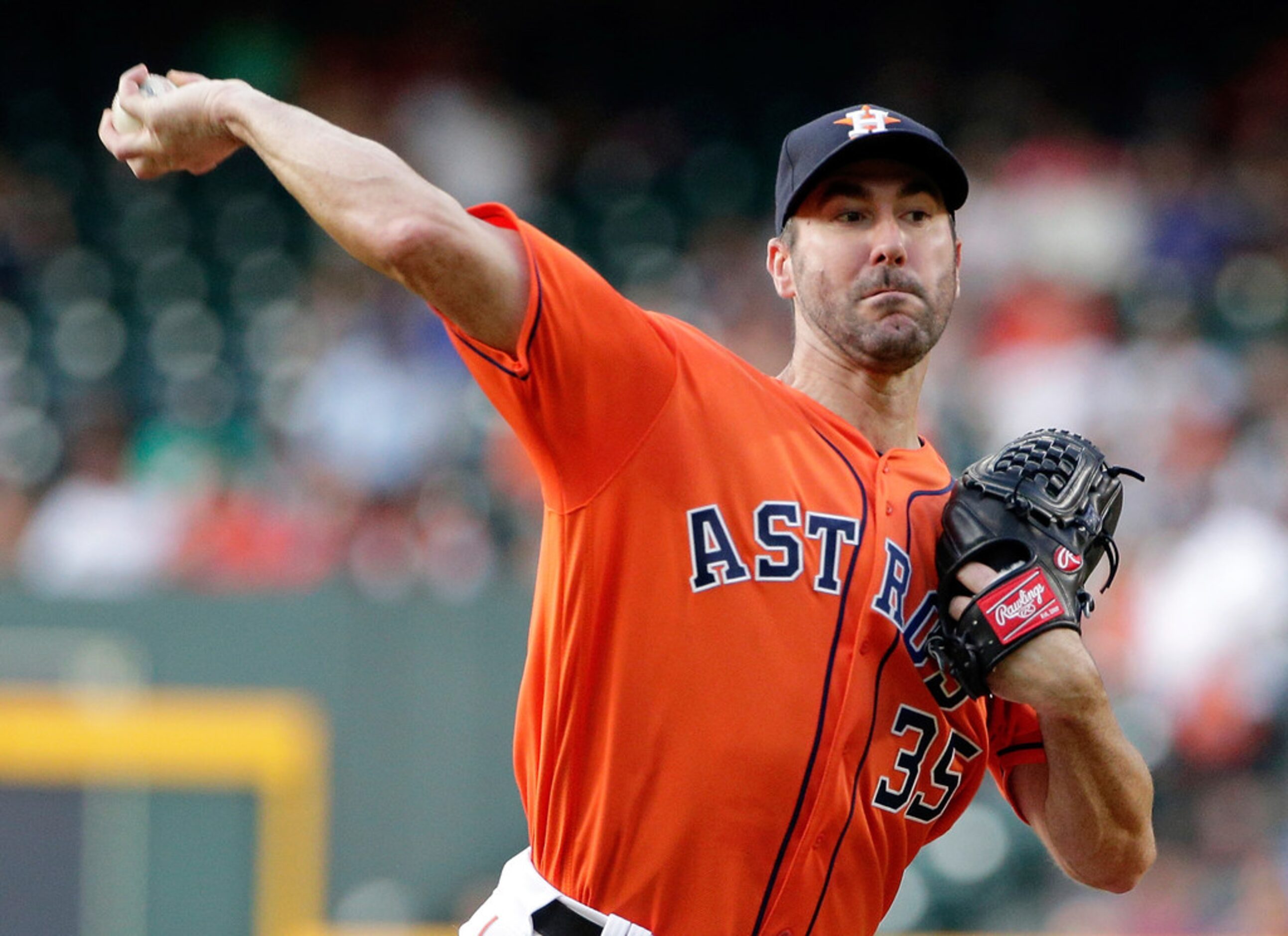 Houston Astros starting pitcher Justin Verlander throws to a Texas Rangers batter during the...