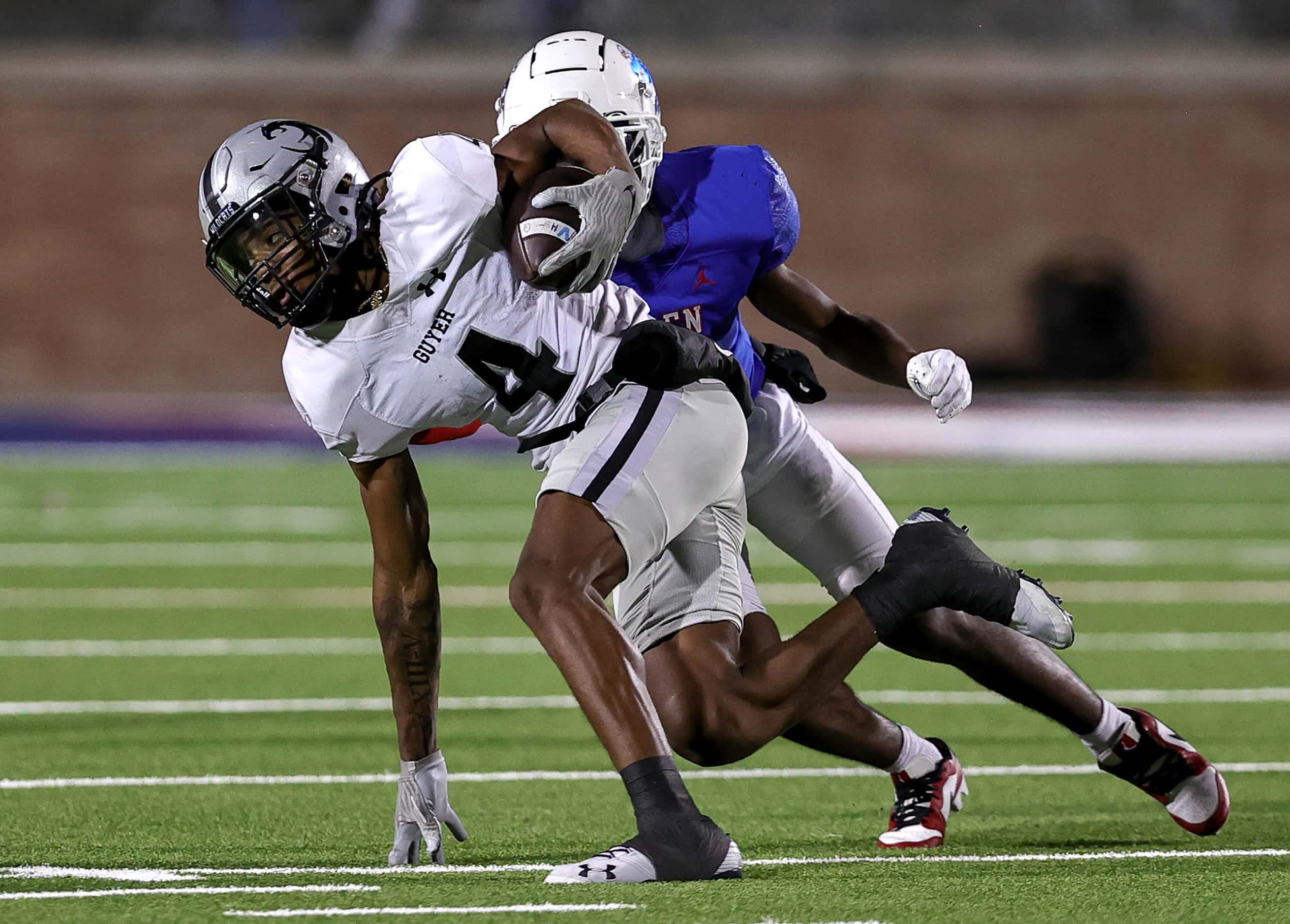 Denton Guyer wide receiver Josiah Martin (4) comes up with reception in front of Allen...