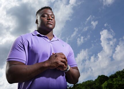 Justin Madubuike poses for photograph at his home in Parker, TX, on Apr. 21, 2020.