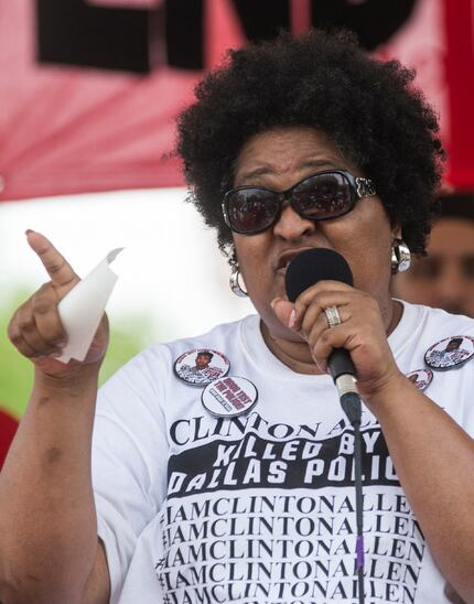 Collette Flanagan speaks at a rally in Pike Park following the "March to End Police...