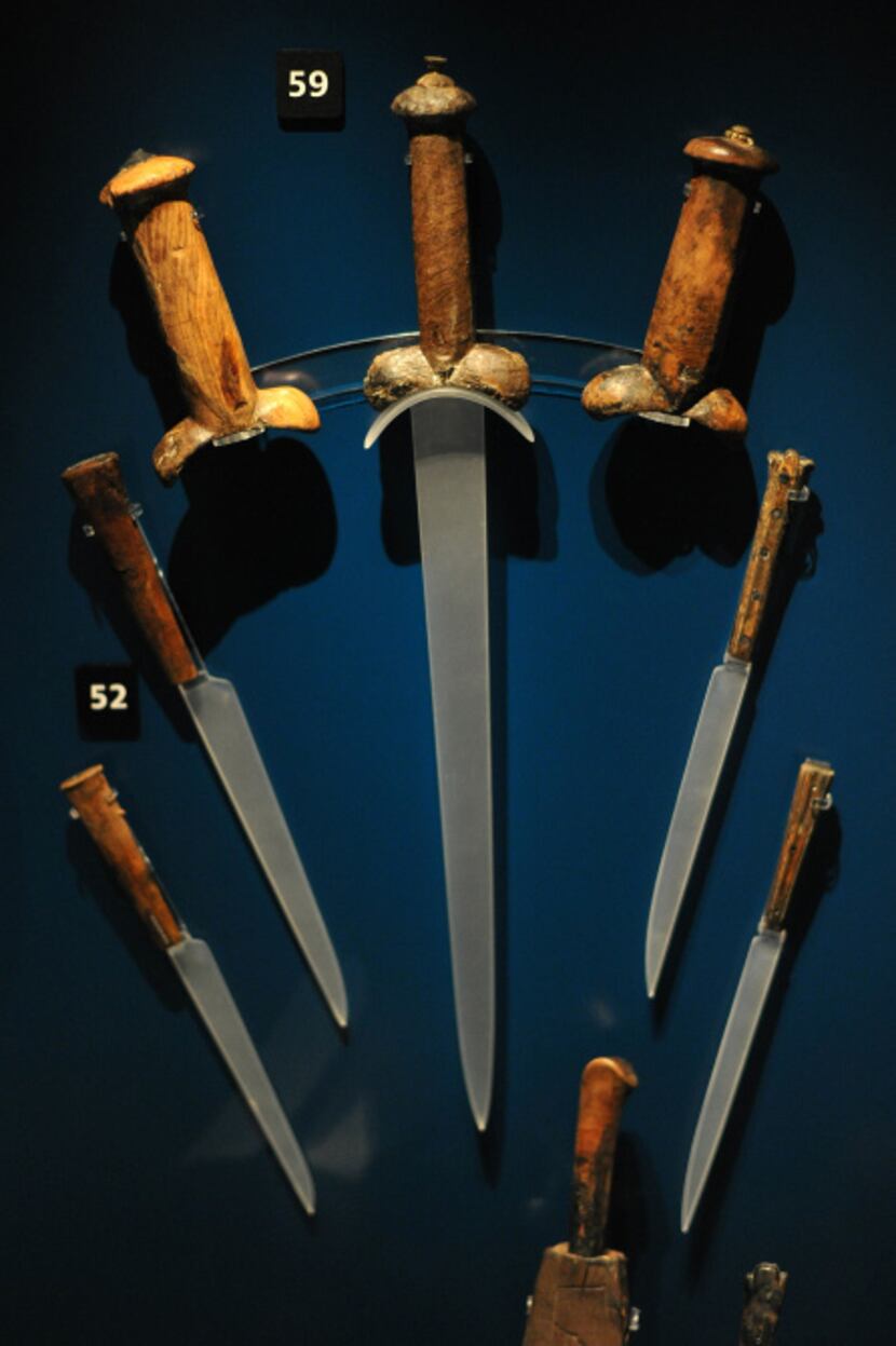 Knife handles recovered from the wreck of the Tudor warship Mary Rose are on display at the...