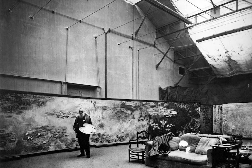 Monet at work in his large studio, 1910. From "Mad Enchantment," by Ross King.