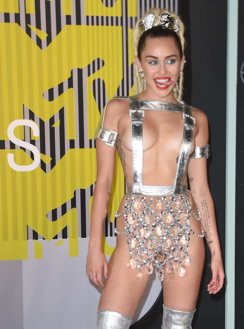 Miley Cyrus arrives on the red carpet at the MTV Video Music Awards (VMA), August 30, 2015...