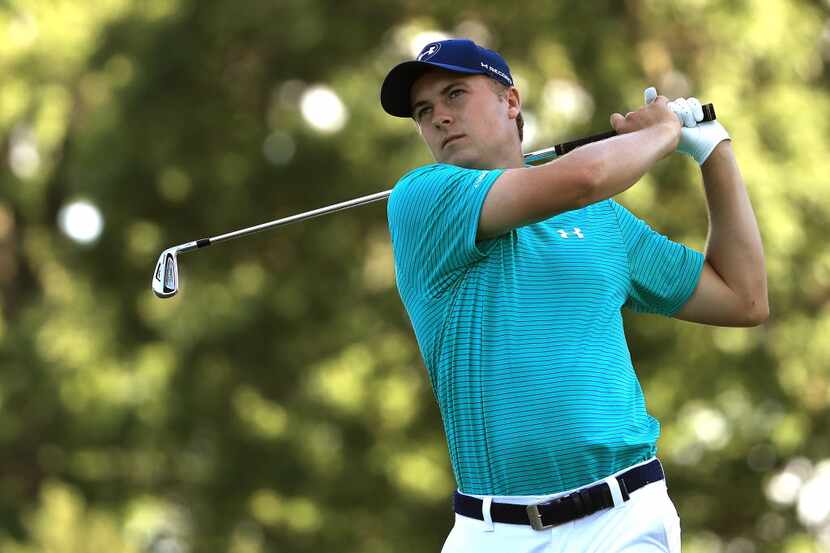 AKRON, OH - JUNE 30: Jordan Spieth hits off the 15th tee during the first round of the World...