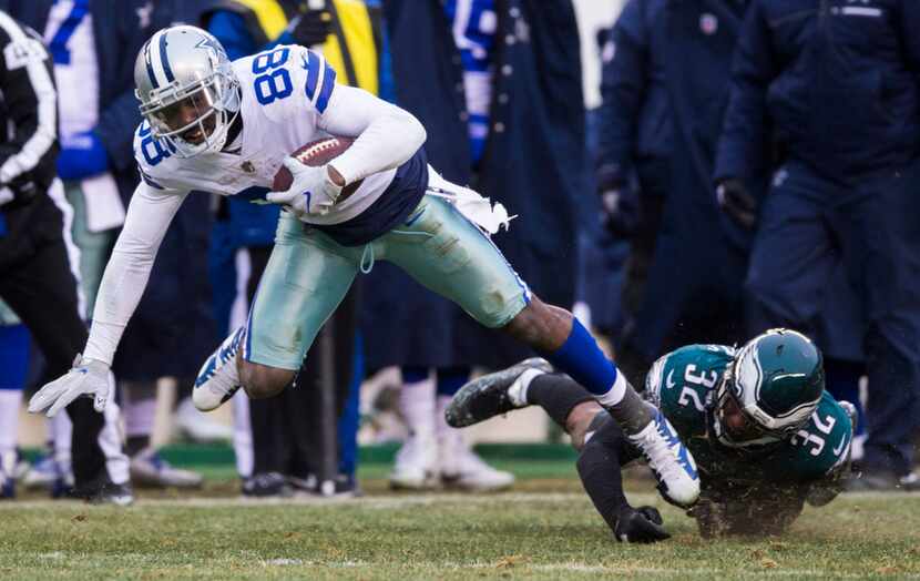 Dallas Cowboys wide receiver Dez Bryant (88) is tackled by Philadelphia Eagles cornerback...