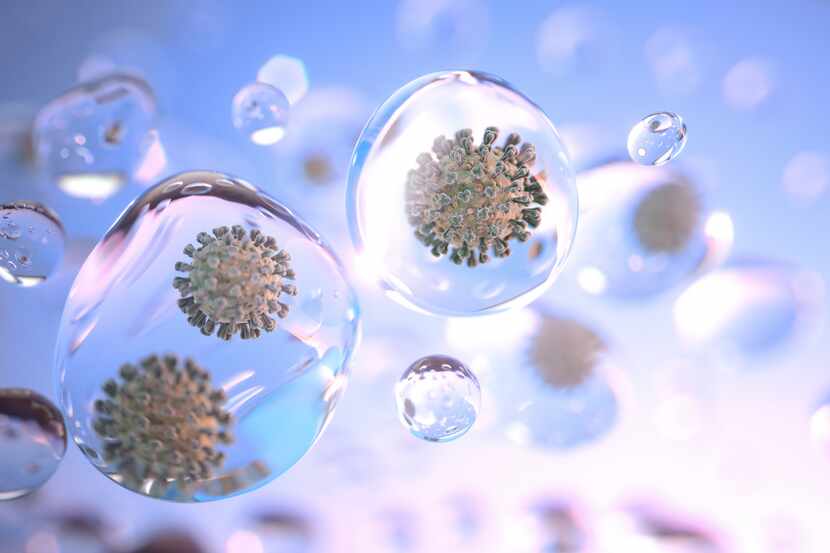 Ilustración que muestra el virus SARS-Cov-2 en burbujas de agua.