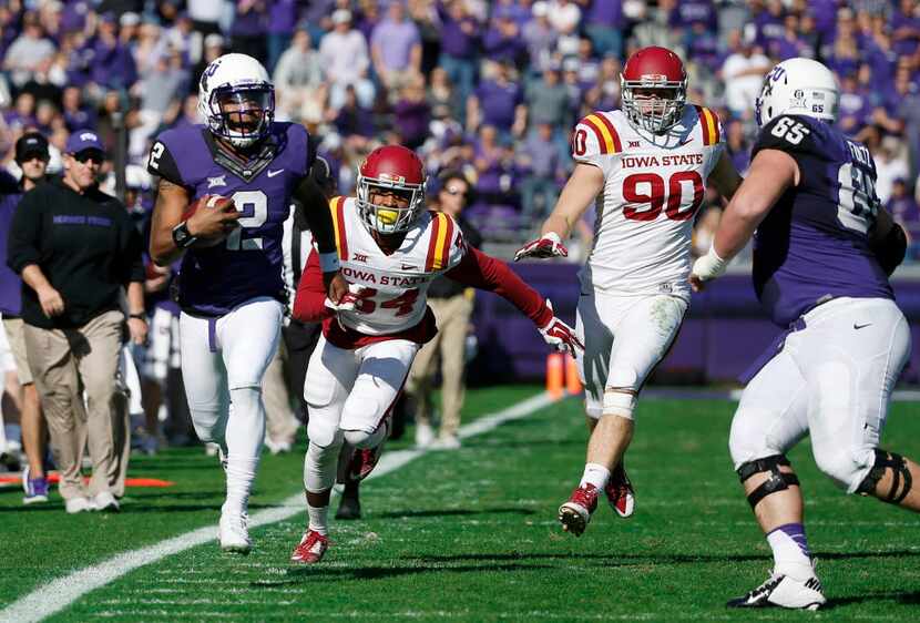 TCU quarterback Trevone Boykin (2) rushes after catching the ball on a reverse play in the...