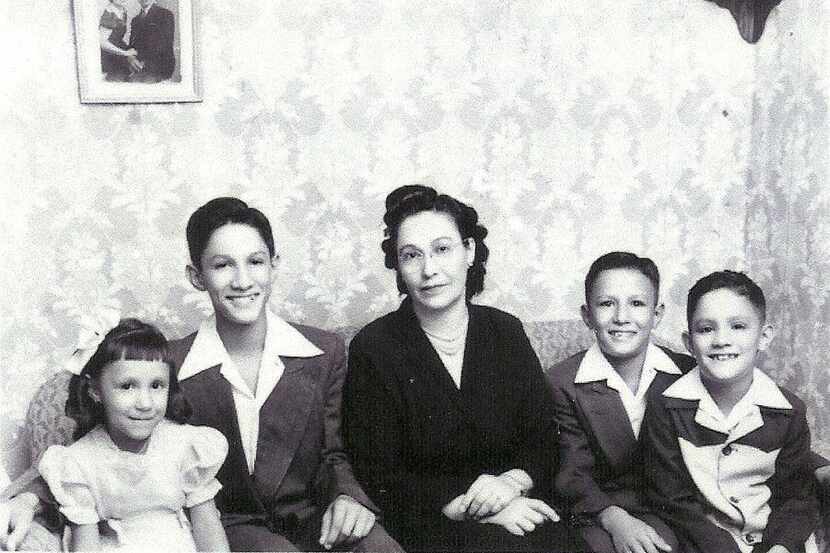 
Emilia Solis Diaz de Leon, center, with her children, from left, Rosalie Solis, Ramon...