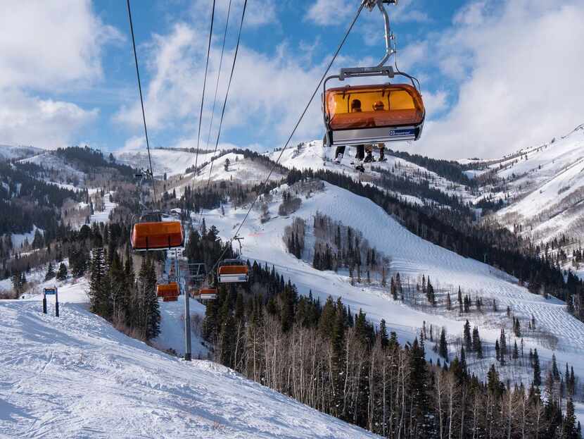 The Orange   Bubble Express  chairlift climbs the slopes on the Canyons Village side of Park...