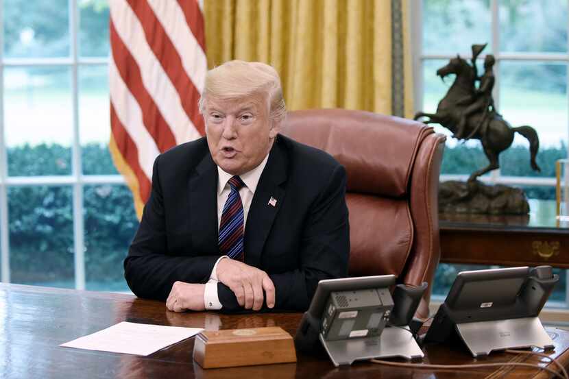 President Donald Trump talked to Mexican President Enrique Pena Nieto during a phone...