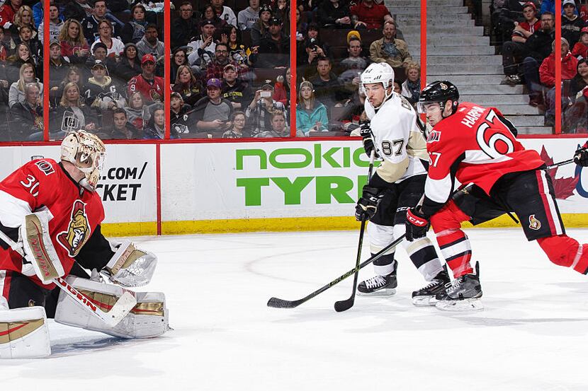 OTTAWA, ON - APRIL 5: Sidney Crosby #87 of the Pittsburgh Penguins shoots the puck wide on...