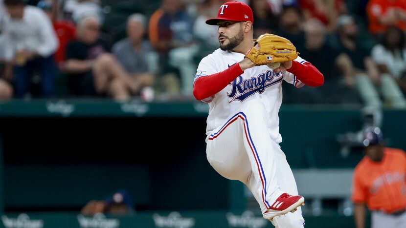 Texas Rangers starting pitcher Martin Perez (54) delivers a pitch during the seventh inning...