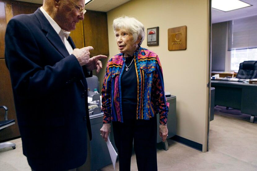 
Office manager Helen Hillbish, 90, speaks Monday with agency owner John G. Taylor at the...